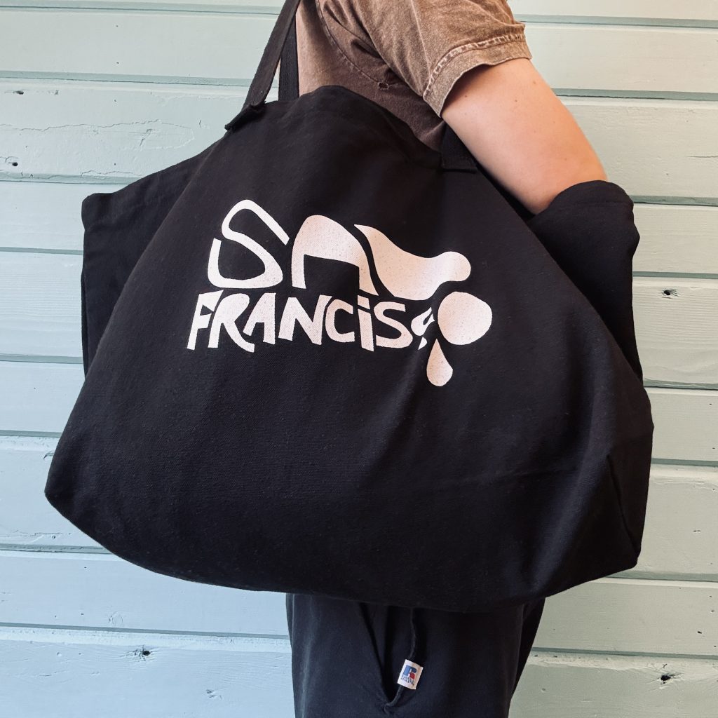 San Francisco canvas tote bag, worn over the shoulder