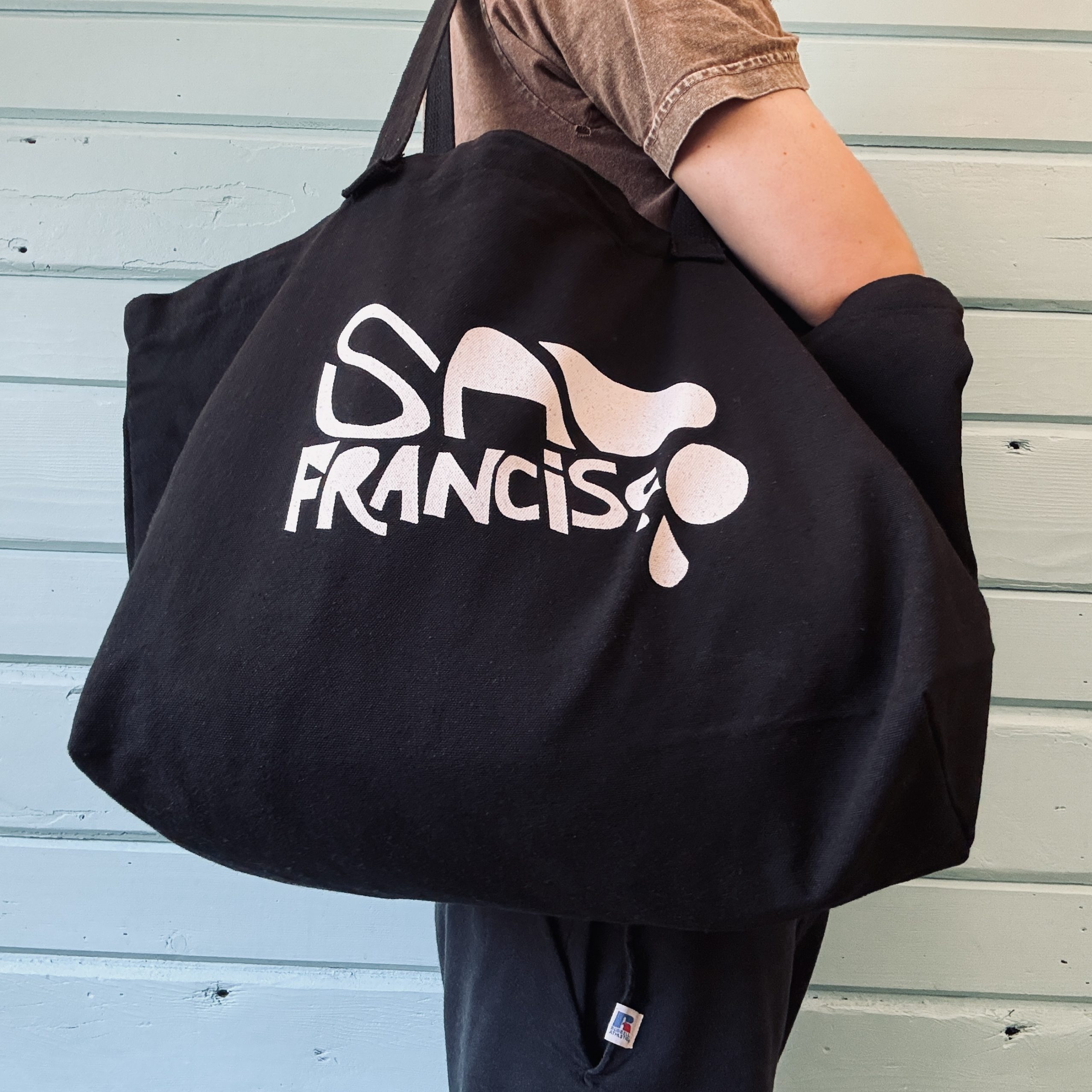 San Francisco canvas tote bag, worn over the shoulder